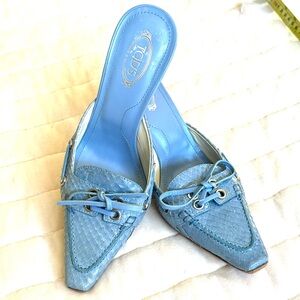 Tod’s blue snakeskin mule.